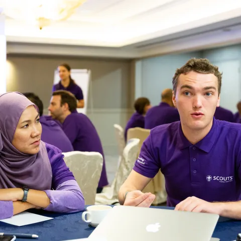 two employees talking